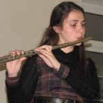 Карина играет на флейте