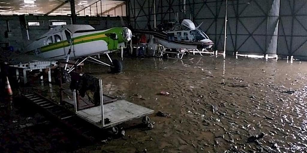 Самолет адвентистской авиации Индонезии (AAI) стоит в ангаре, пострадавшем от внезапных наводнений в восточной провинции Папуа, Индонезия, 17 марта 2019 года. [Фото: любезно предоставлено Adventist Aviation Indonesia]